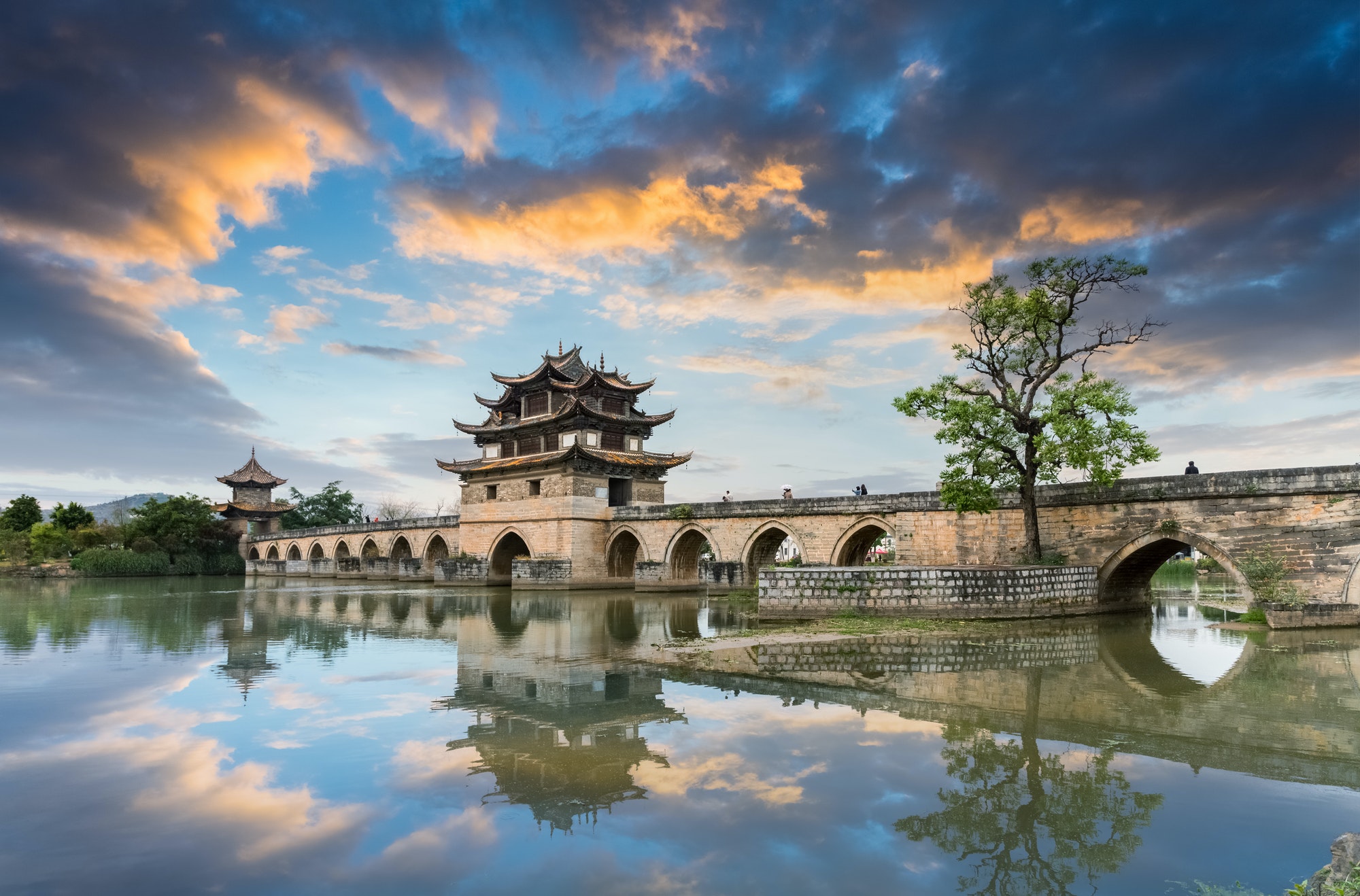 yunnan double dragon bridge in sunset